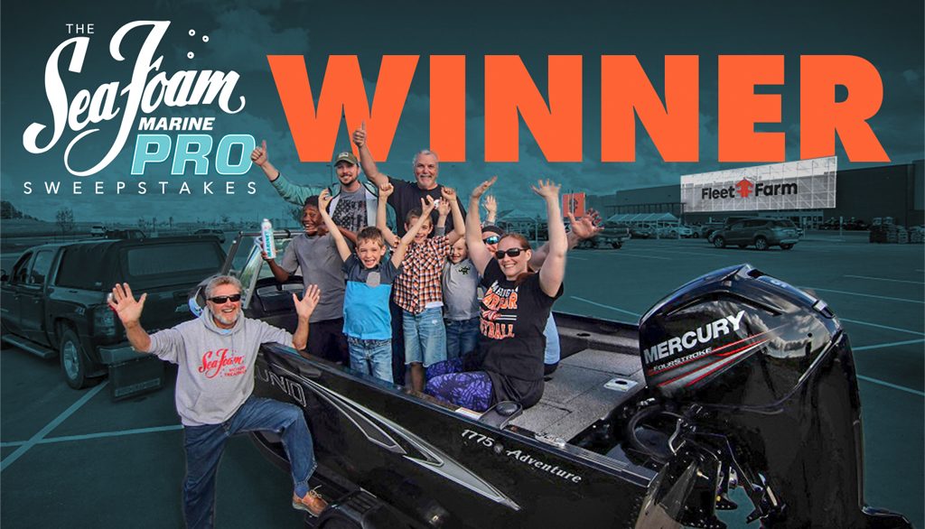 Sea Foam Marine Pro Sweepstakes Winner in front of Fleet Farm